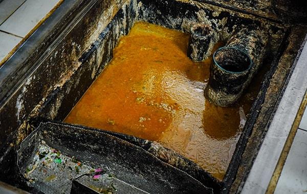 neglecting grease trap cleaning can lead to foul odors, sanitation concerns, and expensive repairs